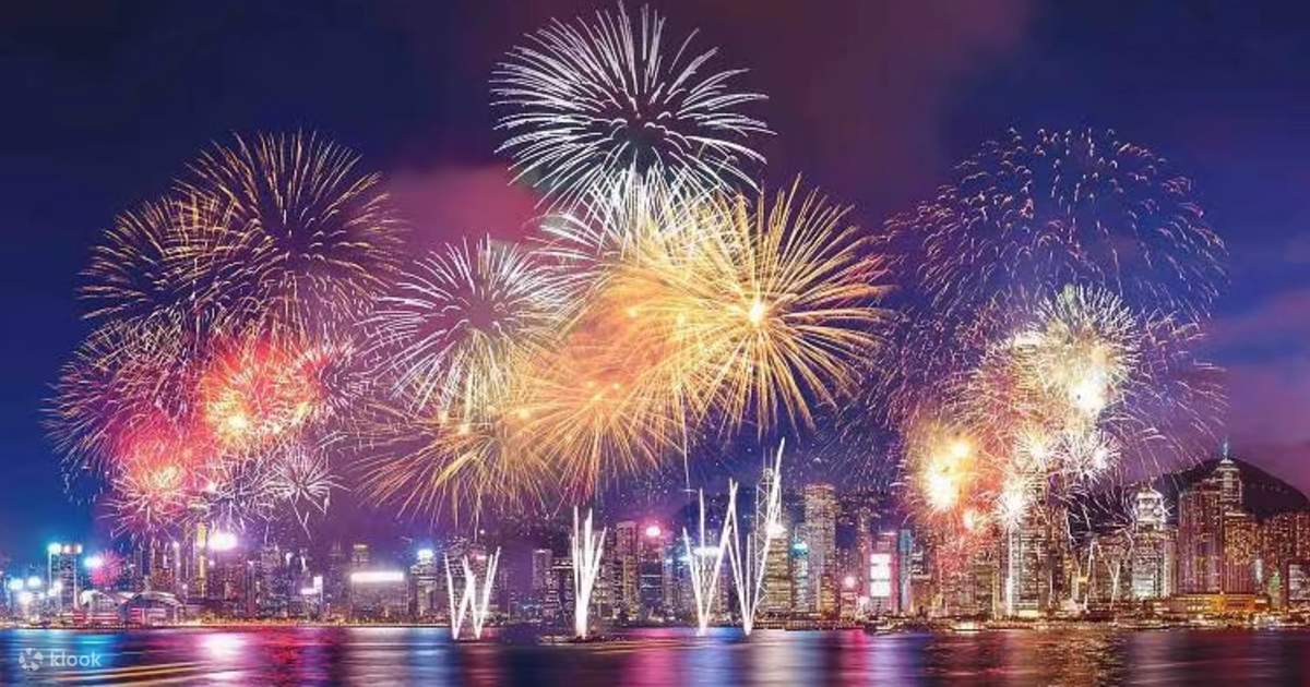 Colorful fireworks light up the night sky over the Hong Kong skyline during the National Day 2025 celebration.